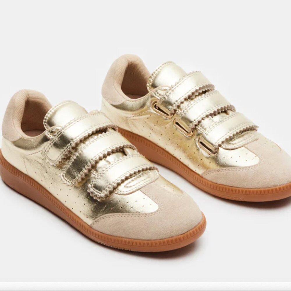 Steve Madden momentum gold sneaker